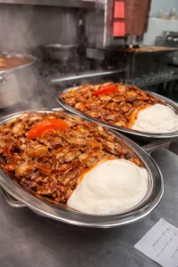 QR Menu Chicken Iskender with doner, tomato sauce, butter and yoğurt