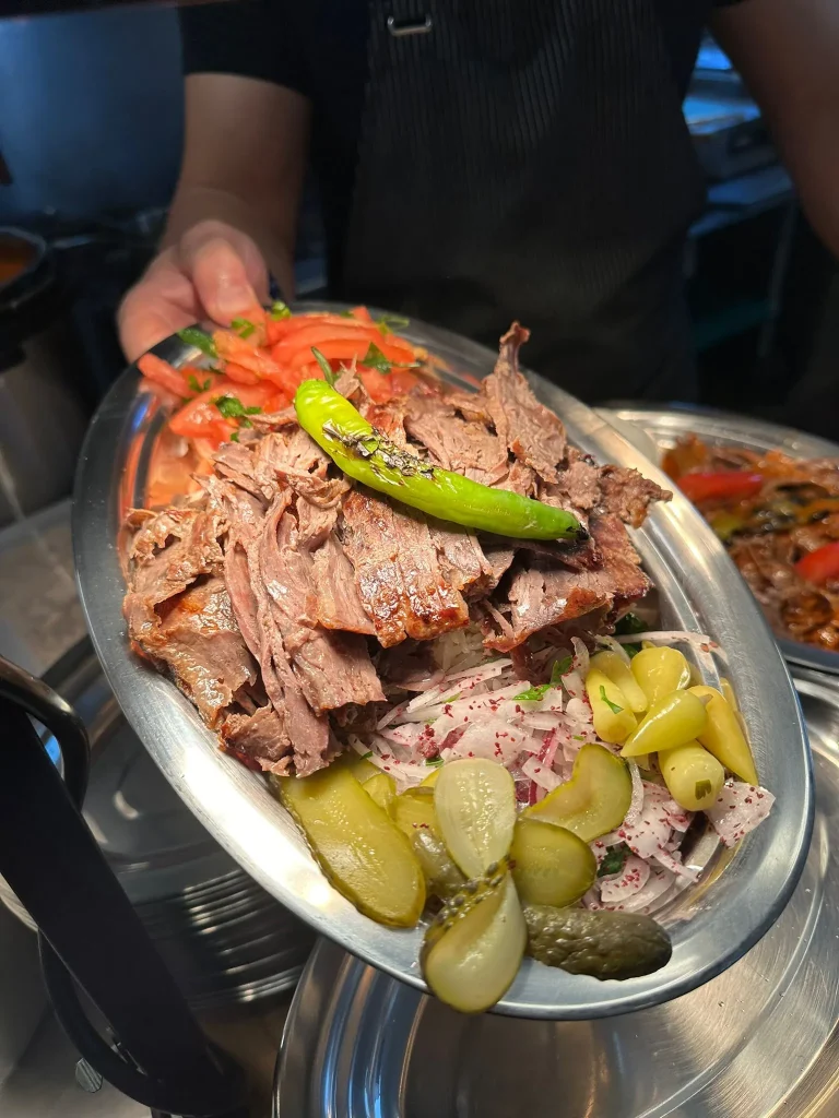 Doner plate with sliced beef doner, rice and salad